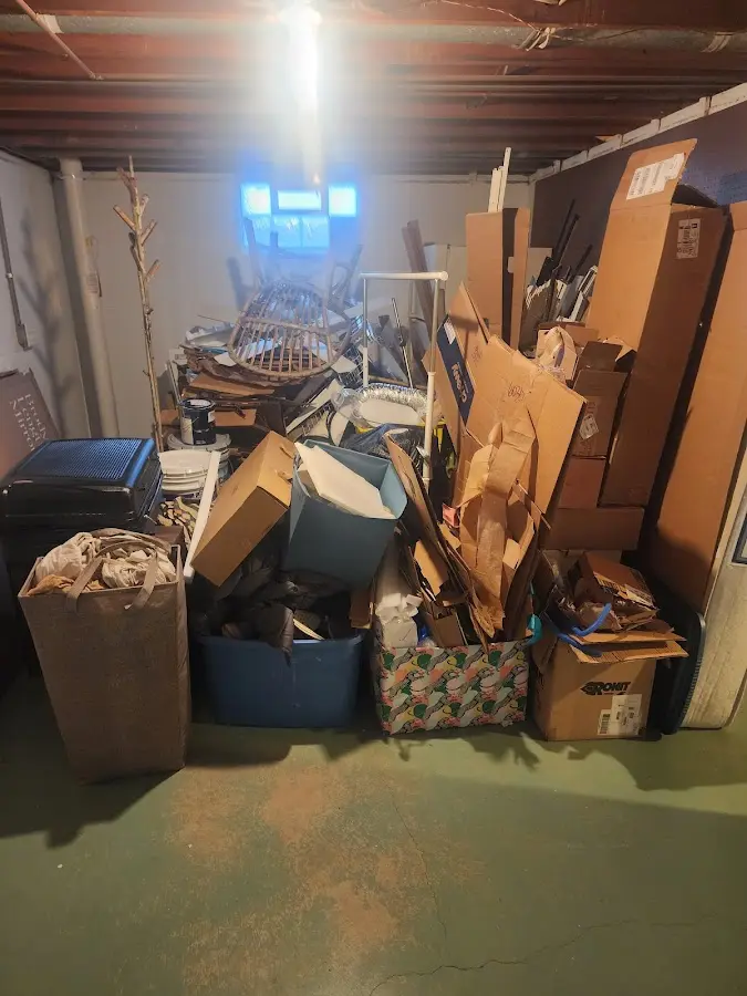 Roll-off dumpster container at job site for Yard Waste Dumpster Rental in Flowood